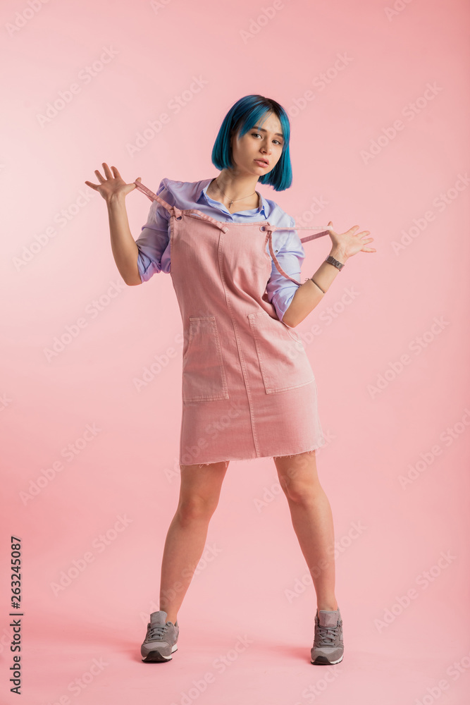 sexy awesome girl follows the latest fashion. isolated over pink background. full length photo. fashion tradition sexy awesome girl follows the latest fashion. isolated over pink background. full length photo. fashion tradition
