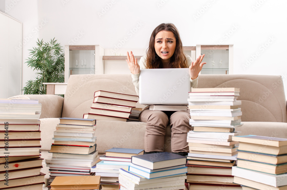 Young female student preparing for exams at home Young female student preparing for exams at home
