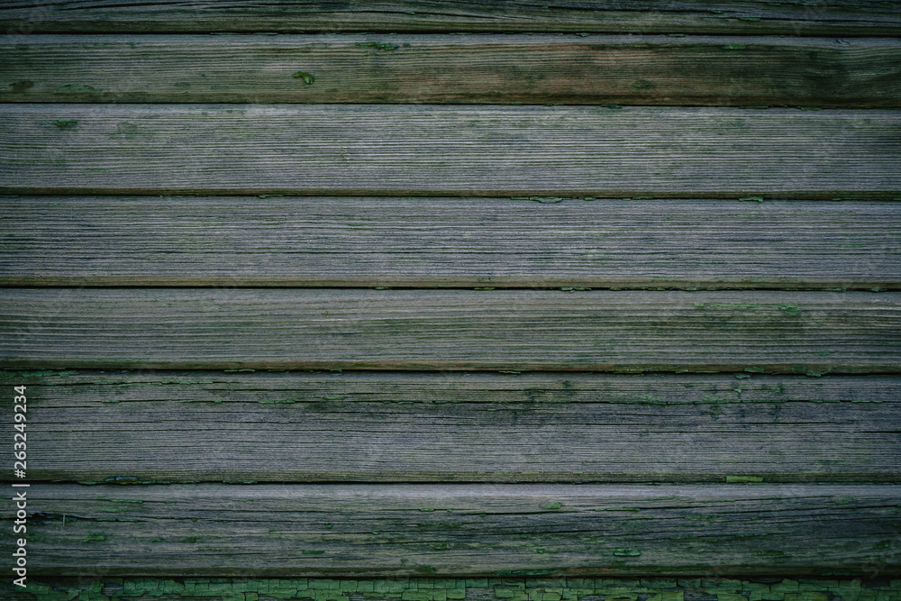 Obraz premium Green wooden texture as background old collapsing fence