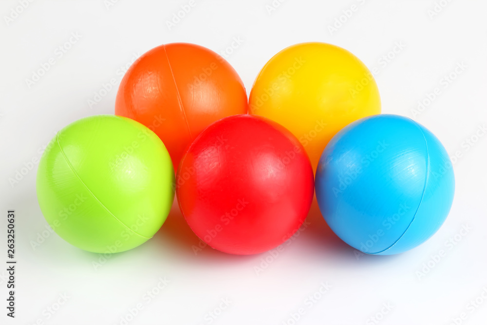 Colored plastic balls on white background Colored plastic balls on white background