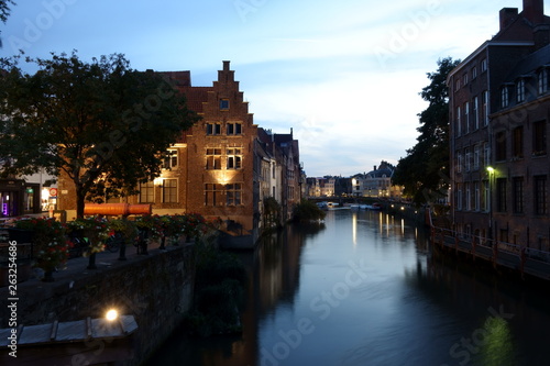 Night view of the river Leie with evening lighting and the cannon "Dulle Griet" ("The Mad Mag") on the left side (Ghent, Belgium)