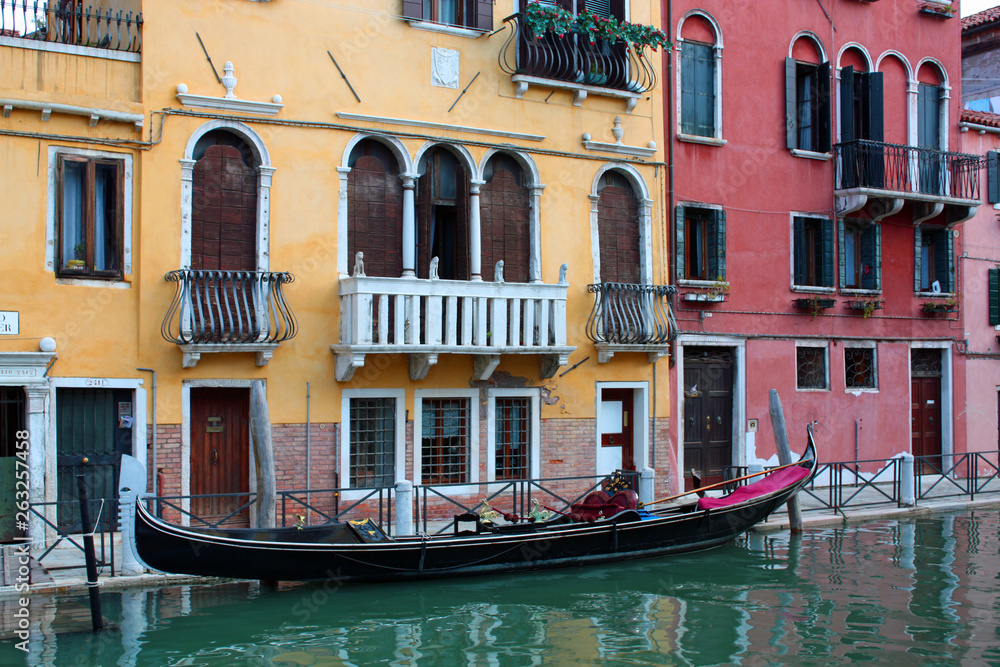 Colourful buildings and gondola in Venice, Italy 