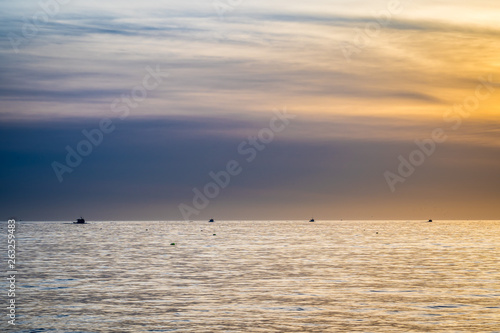 Lobster fishing boat scenery of Canada's Atlantic coast with a beautiful sky.