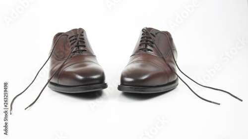 Classic men's brown shoes on white background. Leather shoes