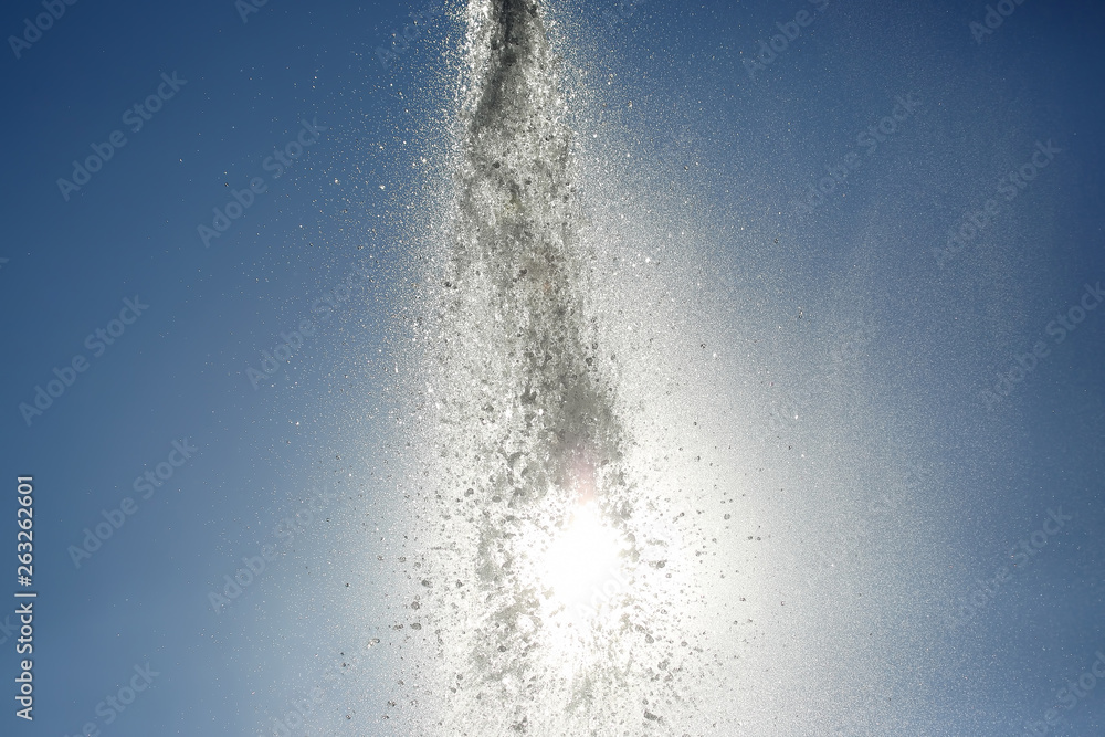 drops of the fountain in the setting sun drops of the fountain in the setting sun