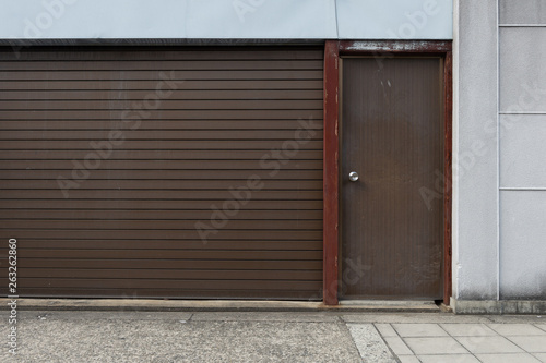 sidewalk by street wall & door