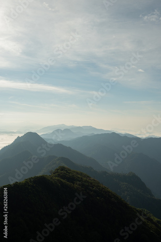 scenic mountain lined with alternates. The morning sun shines and fog covered the mountain. Doi KALHEPU, Mae Moei, Tak in Thailand