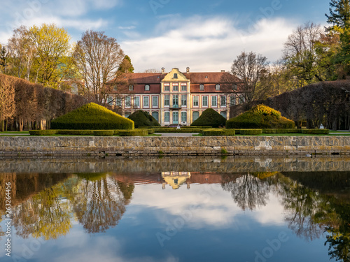 Abbots Palace in the rococo style and located in Oliwa Park. Early spring scenery. Gdansk, Poland. 