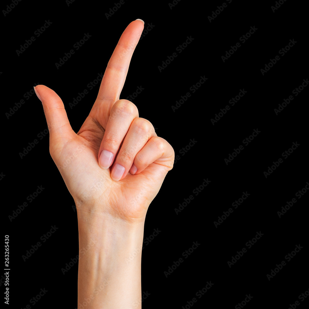 Woman hand with the index finger pointing up Woman hand with the index finger pointing up