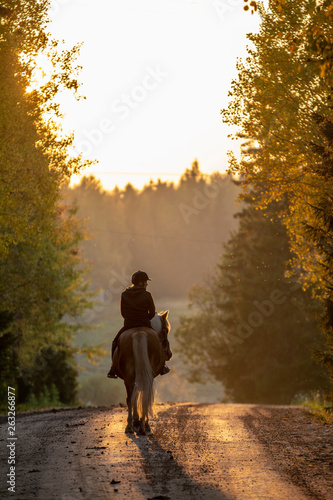 Woman horseback riding