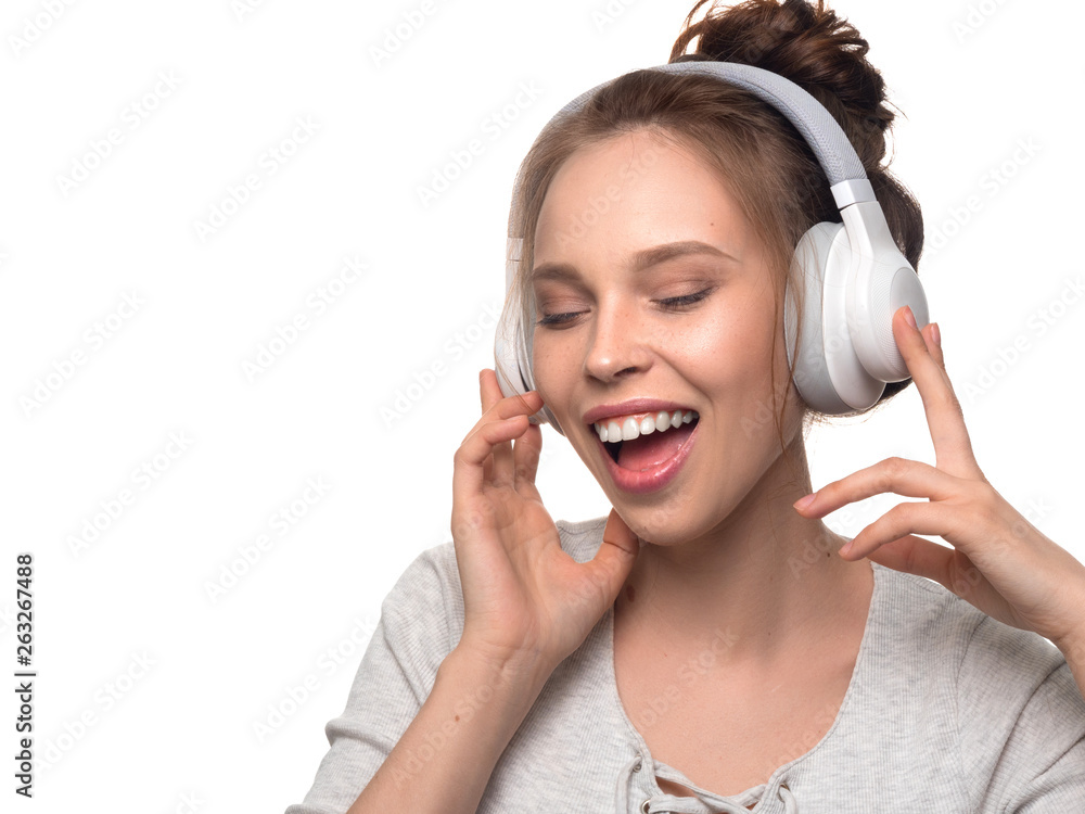 Fototapeta premium attractive girl with headphones on white background
