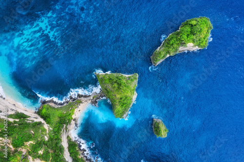 Aerial view at sea and rocks. Turquoise water background from top view. Summer seascape from air. Atuh beach, Nusa Penida, Bali, Indonesia. Travel - image