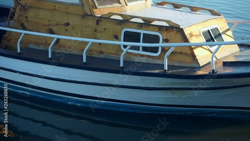 Wallpaper Mural motion along old boat with wooden deck mooring at beach Torontodigital.ca