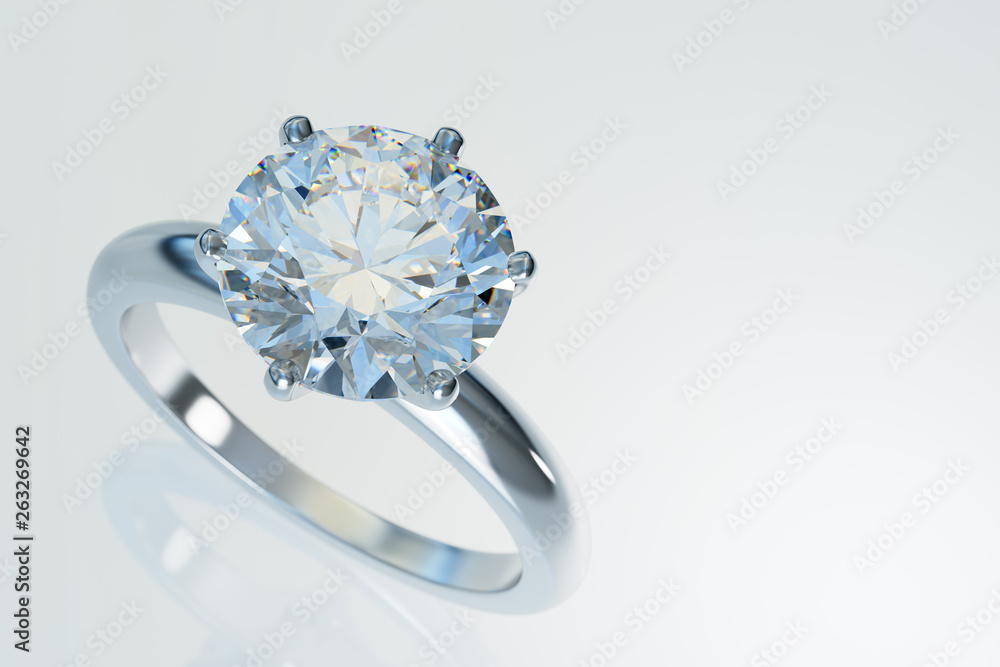 Solitaire diamond engagement ring on white background Solitaire diamond engagement ring on white background