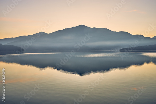 Wallpaper Mural Beautiful sunrise scenics of Sun Moon Lake with the surrounding mountains are the highlight at this sprawling lake at Yuchi, Nantou in Taiwan. Torontodigital.ca