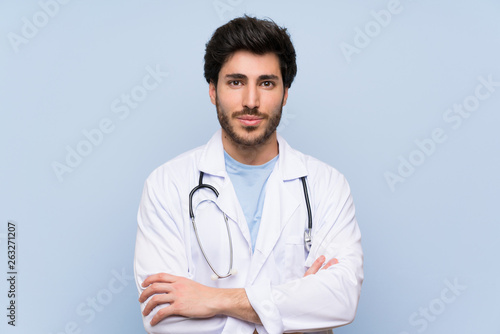 Doctor man keeping arms crossed