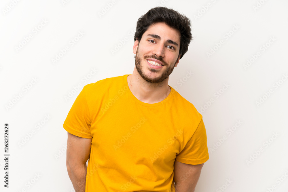 Handsome over isolated white wall laughing Handsome over isolated white wall laughing