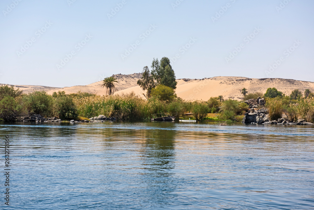 View of river nile in Aswan Egypt showing cataracts and mountain