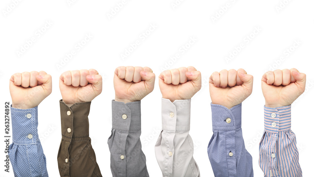 Fototapeta premium Male hands in fists in different shirts on white background