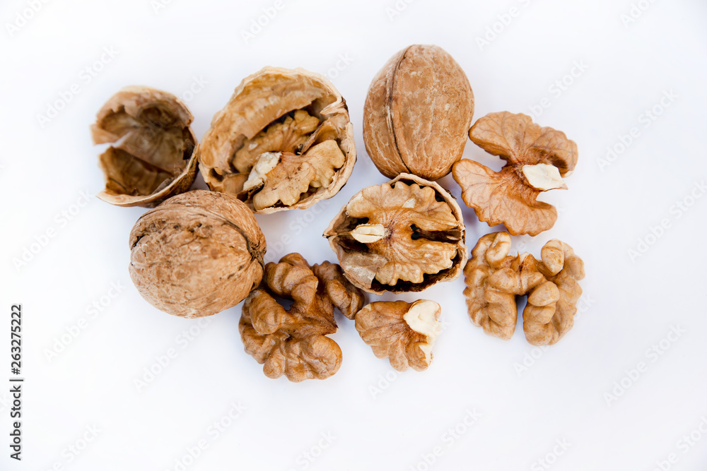 Healthy food and snack. Walnuts kernels on white background. Fruits of walnut. Healthy food and snack. Walnuts kernels on white background. Fruits of walnut.