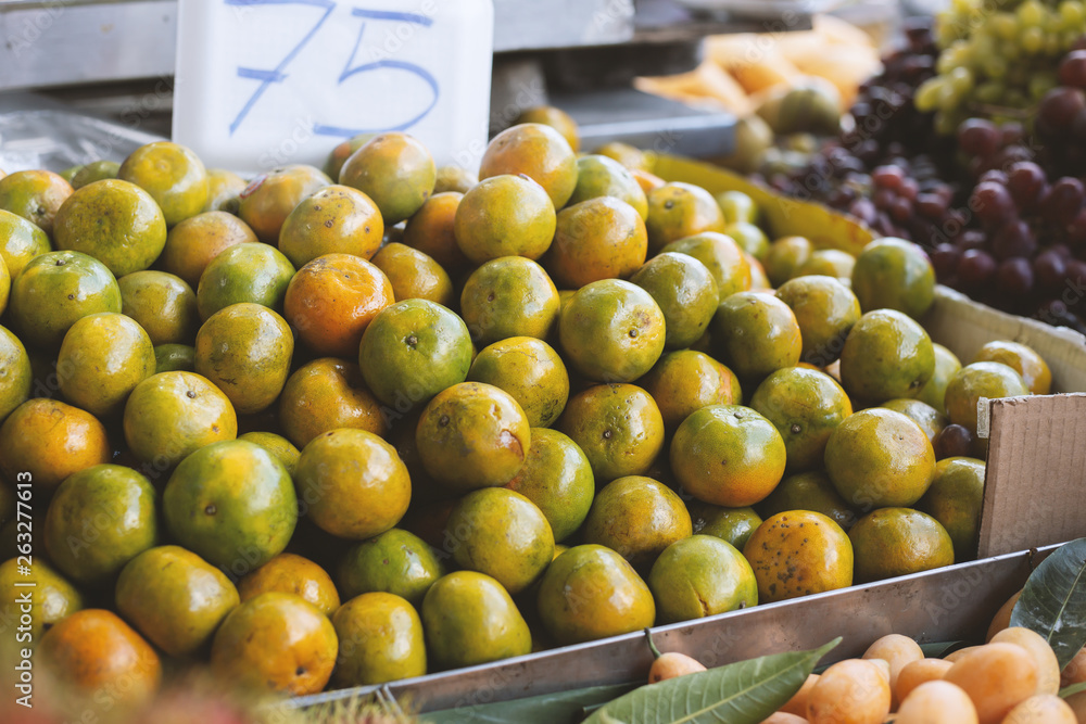 green oranges in the market in Thailand