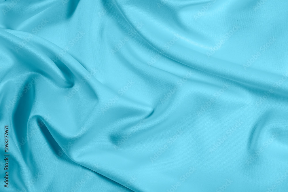 Obraz premium Closeup of rippled light blue satin fabric