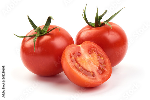 Fresh ripe tomatoes, close-up, isolated on white background