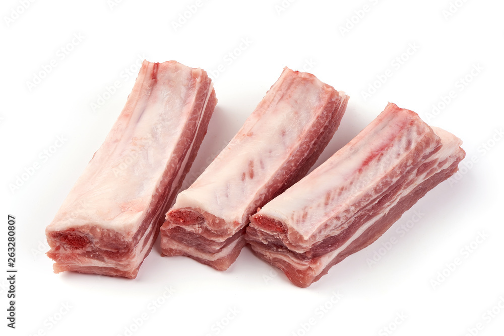 Raw meat ribs, close-up, isolated on white background Raw meat ribs, close-up, isolated on white background