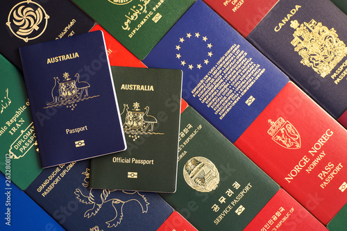 Passport and official passport of Australia against the background of various documents of many countries of the world