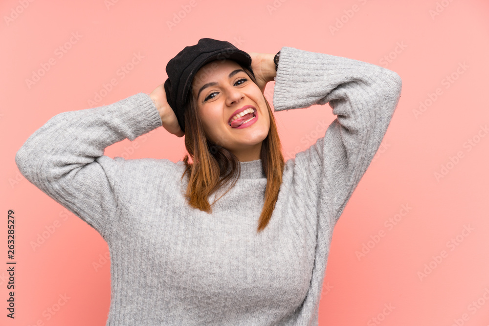 Fashion woman with hat over pink wall laughing Fashion woman with hat over pink wall laughing