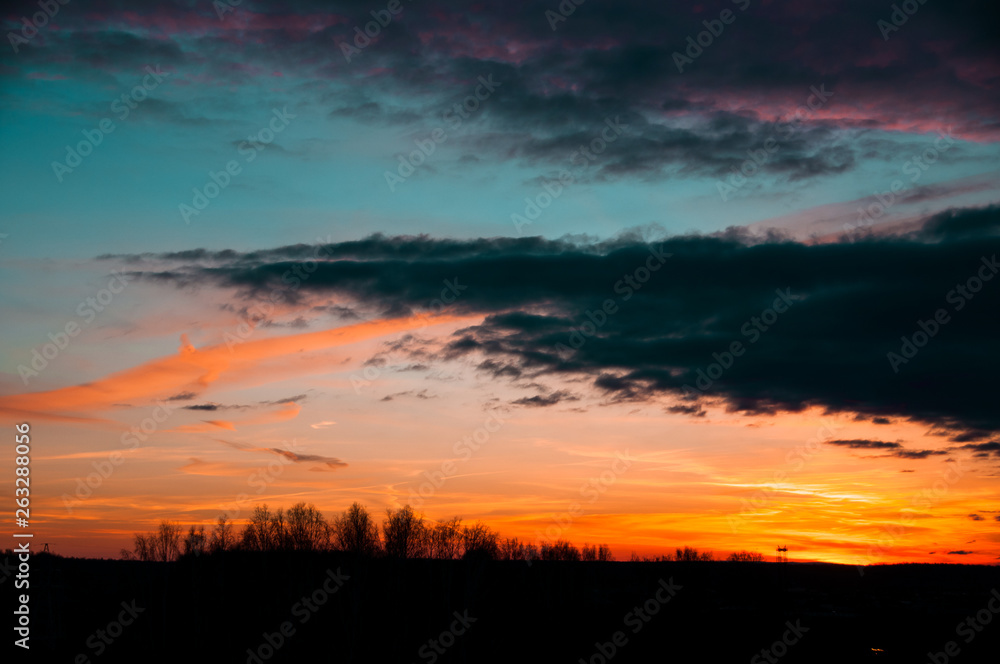 bright sky with clouds at sunset