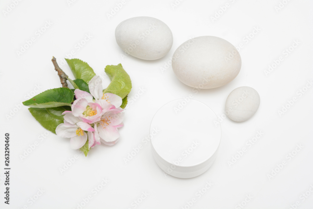 Beauty product container with blossom and nature theme Beauty product container with blossom and nature theme