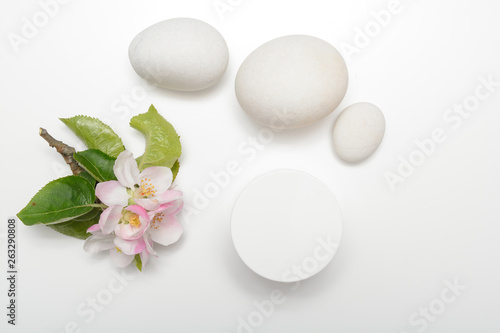 Beauty product container with blossom and nature theme