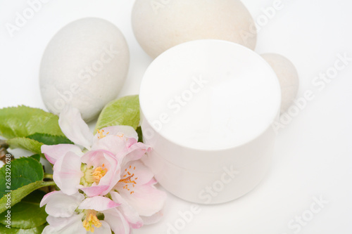 Beauty product container with blossom and nature theme