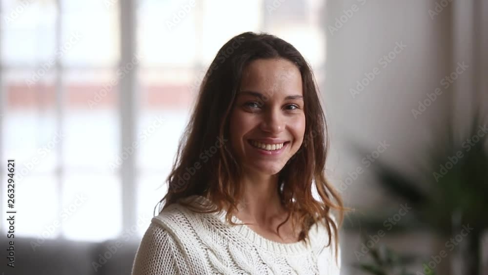Video portrait of happy young woman posing at home Video portrait of happy young woman posing at home