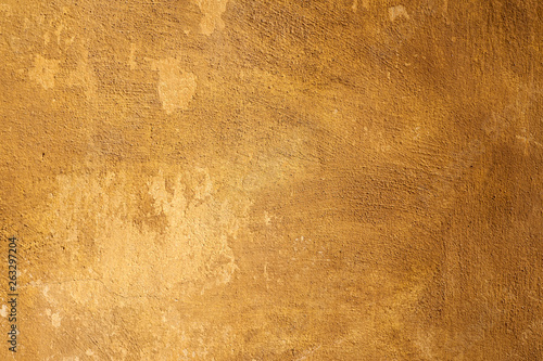 Abstract orange background texture rare vintage cement wall. 