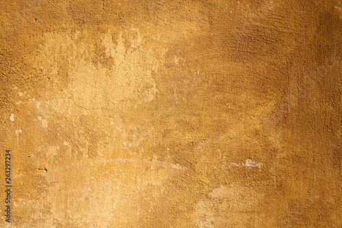 Abstract orange background texture rare vintage cement wall. 