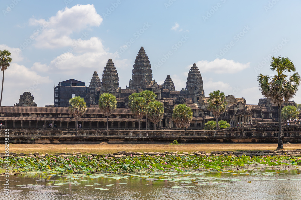 Angkor Wat temple seen across the lake with lotuses, Siem Reap, Cambodia Angkor Wat temple seen across the lake with lotuses, Siem Reap, Cambodia