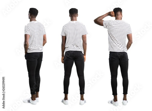 Set of Dark skinned man with striped shirt looking back photo