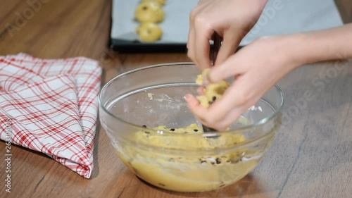 Wallpaper Mural Woman in kitchen making chocolate chip cookies. Torontodigital.ca