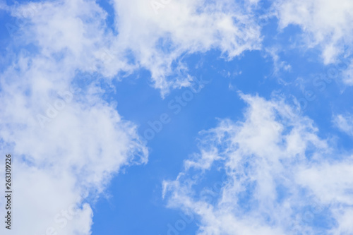 Bluy sky with white clouds background and free space with hearts