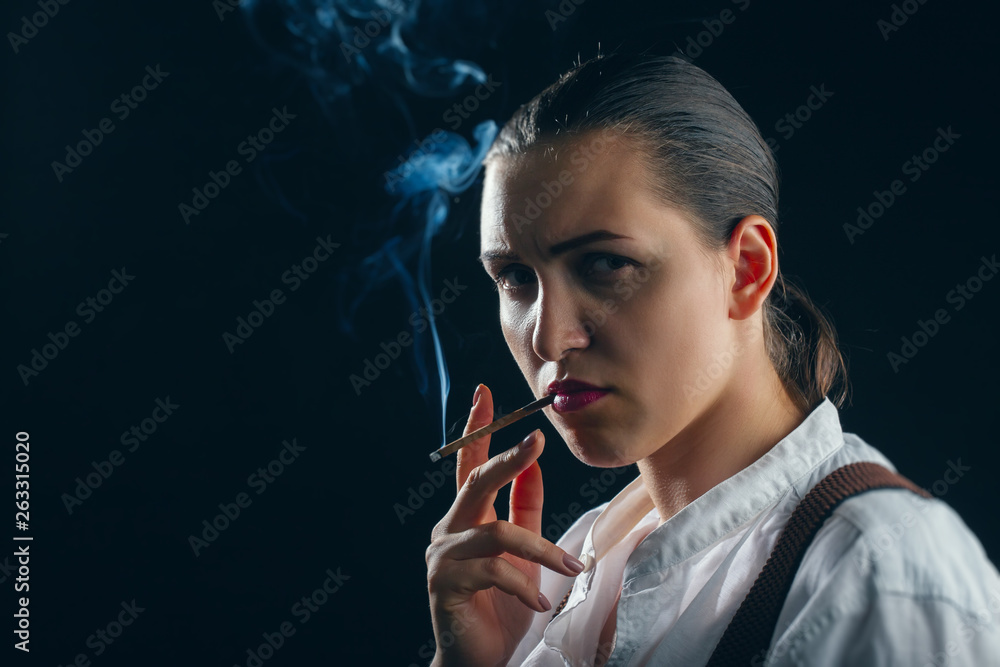 Fototapeta premium woman smoking cigarette