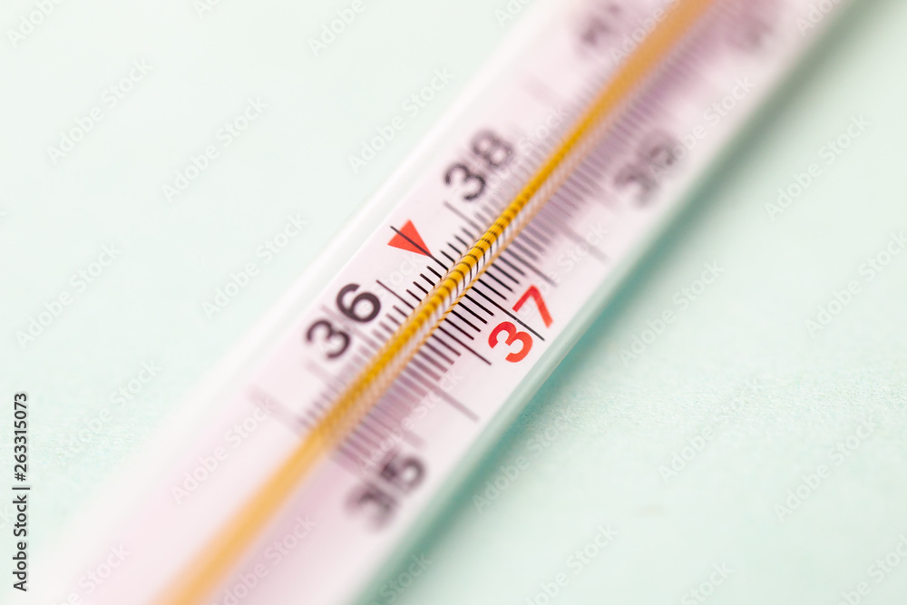 mercury thermometer isolated on white background, focus on 37 degree mercury thermometer isolated on white background, focus on 37 degree