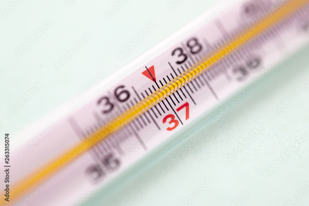 mercury thermometer isolated on white background, focus on 37 degree mercury thermometer isolated on white background, focus on 37 degree