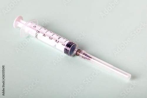 Syringe isolated on light background, medical tools