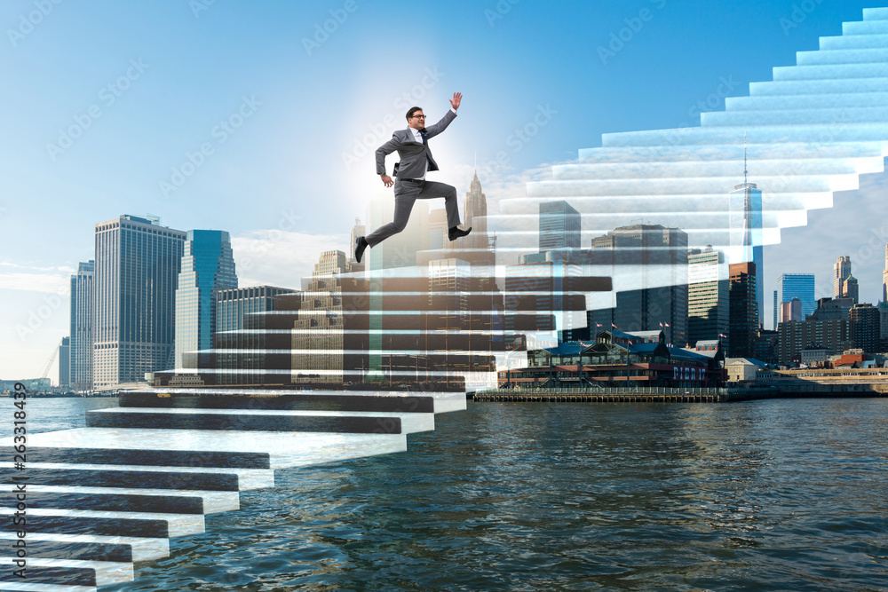 Businessman climbing career ladder over city