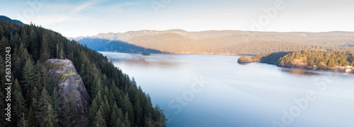 An aerial panorama of Quarry Rock with hikers on-top in Deep Cove, North Vancouver. photo