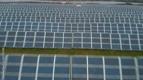 Wallpaper Mural Clean natural energy power concept. Top view of the long blue solar panels on the ground outdoors. Torontodigital.ca