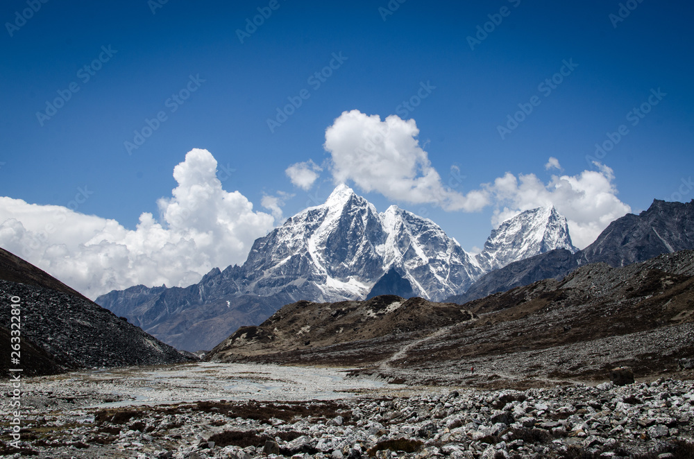 Stunning view of Lobuche mountain from trek to Everest and island peak. Himalayan  landscape at bright day at high altitude