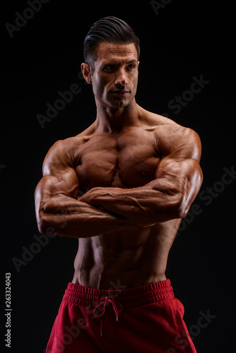 Handsome Muscular Men Flexing Muscles © mrbigphoto